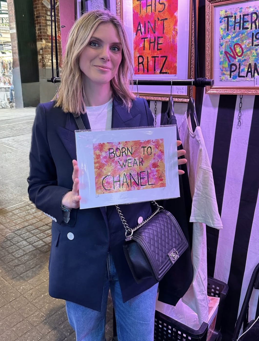 A collector with Born to Wear Chanel at Luis Alvarez's stall